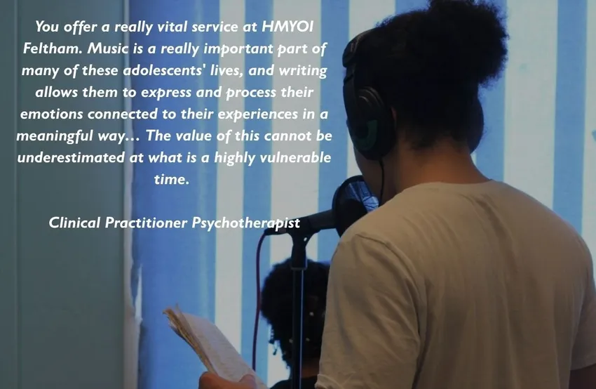 One Spirit participant reading into a microphone