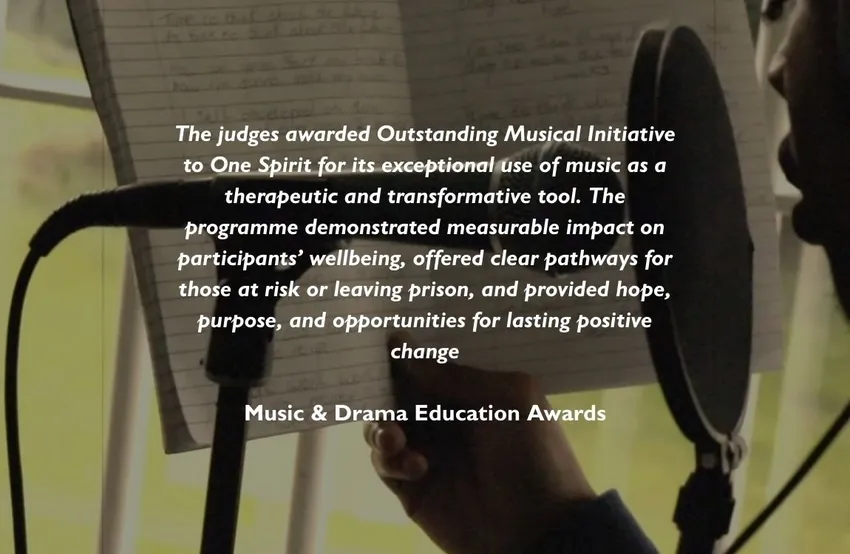 One Spirit participant reading into a microphone