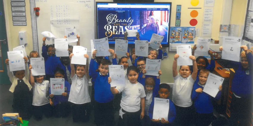 Primary School with their drawings of Beauty and The Beast