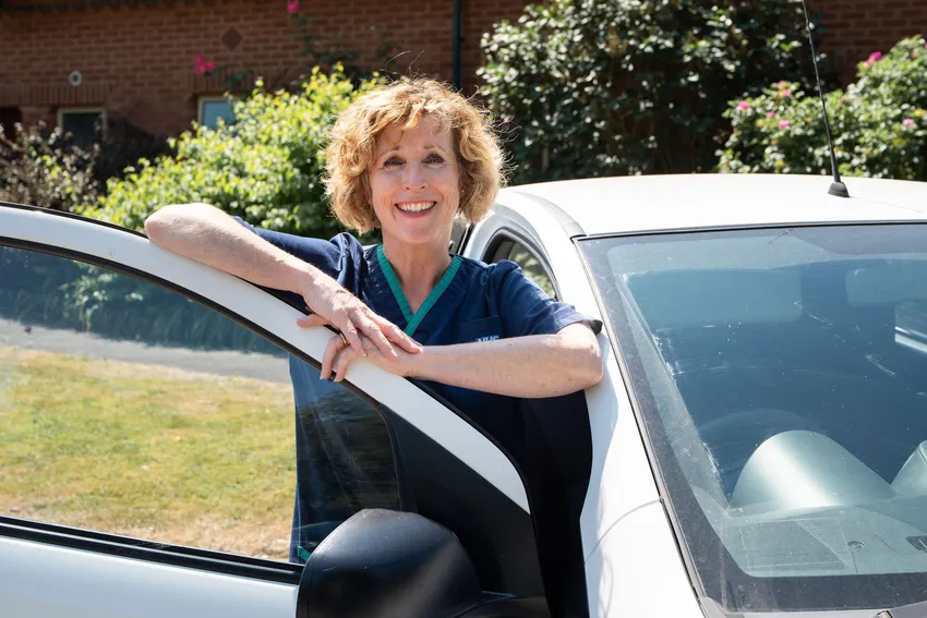 20260708 CNS Claire leaning on car door smiling 1