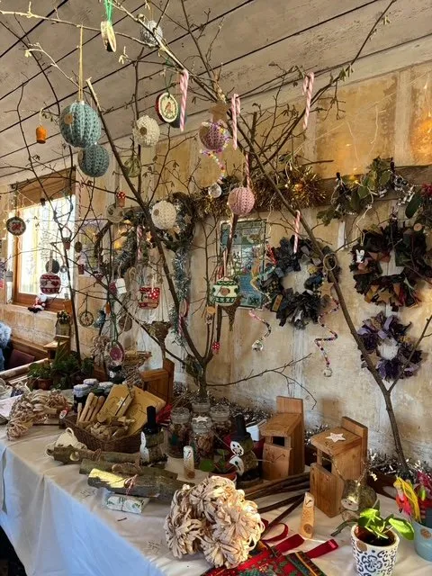 Stall with Christmas crafts made by participants