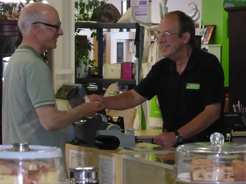 Companion Tony 'at work' serving customer
