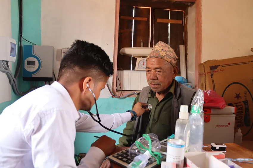 Community member receiving a health check up at his local clinic