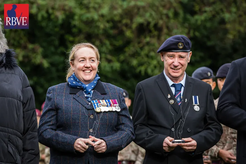 Two veterans smiling with medals - RBVE's community