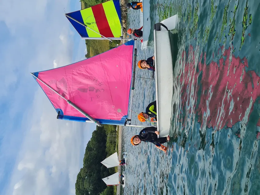Children learning to sail on Helford Passage