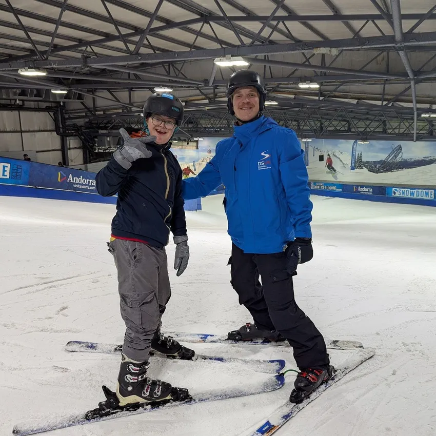 Skier with instructor at our young people's ski group in Tamworth
