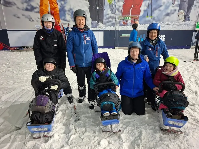 Young people in bi skis at our South of England Snowsport School