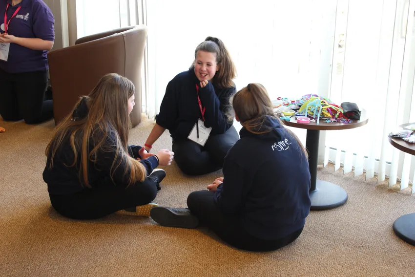 Girls chatting at young leaders event
