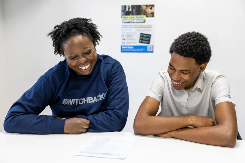 A Switchback Mentor and Trainee working on his action plan