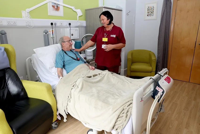 Patient Glenn with Emma in the Farleigh Hospice in-patient unit