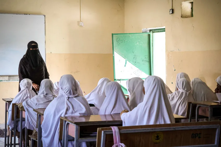 Female students with a female teacher in a classroom in Somaliland