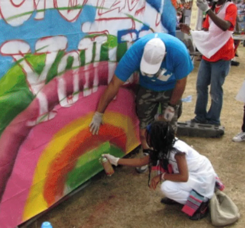 Young people taking part in graffiti art workshop