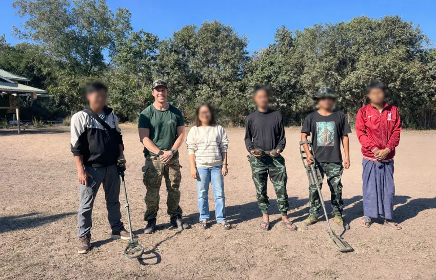 Jonathan and local demining team