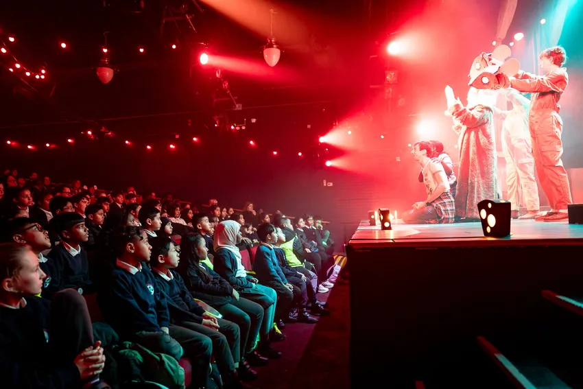 Children enjoying a show for free at Polka through our Curtain Up programme