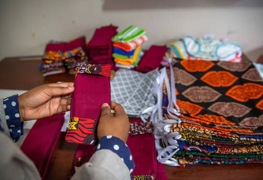 Making and distributing reusable sanitary pads at Umoja