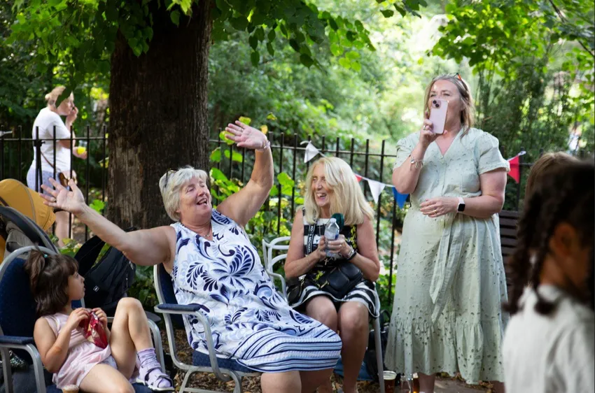 People singing and having fun at the Summer Party