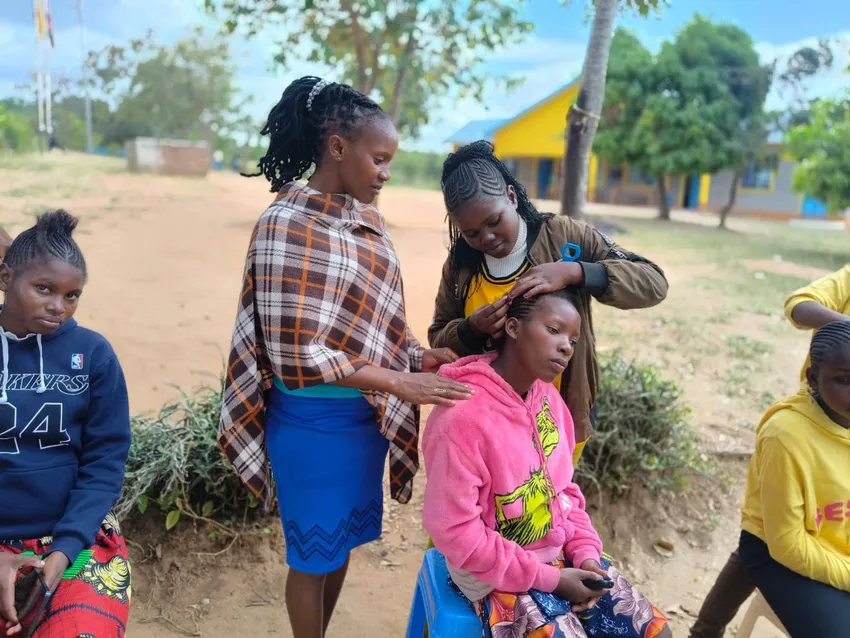 Hairdressing & Beauty students in Kitui, mentored by returning graduate Esther