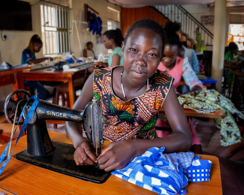 Perfecting her craft at our Tailoring and Knitting Project