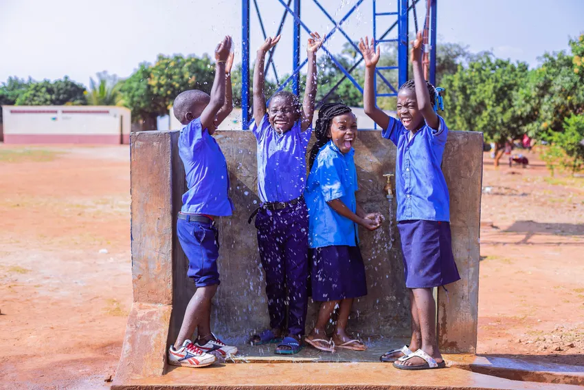 School children at a waterpoint