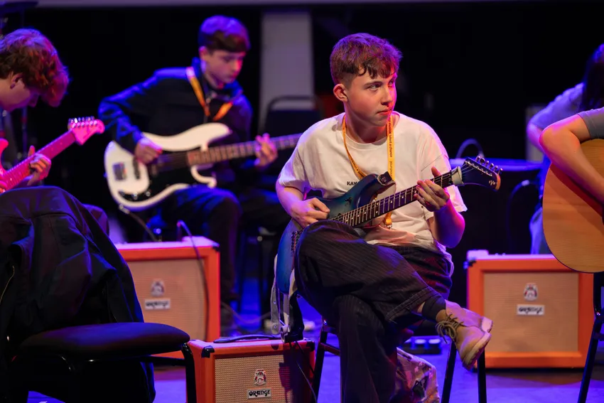 Young musician with a guitar