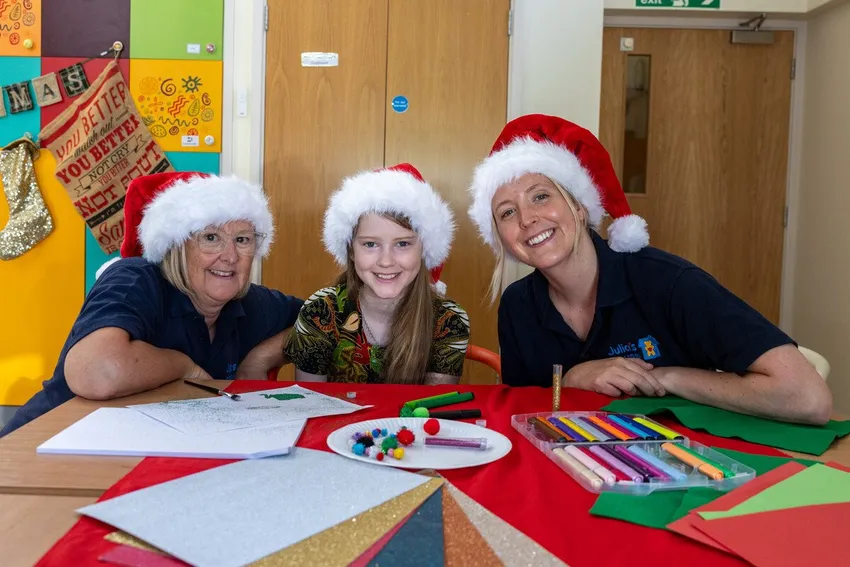 Aurora with her 2 Julia's House nurses at the hospice