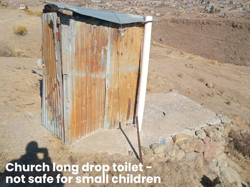 Church long drop toilet which is not safe for small children