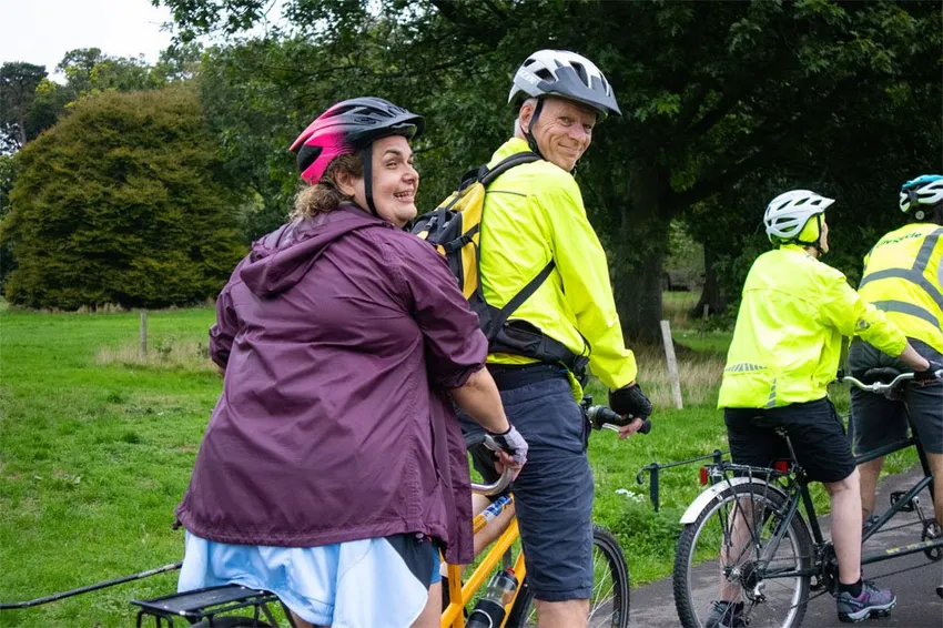 Sally, one of our visually impaired Two's Company riders enjoying a tandem ride.