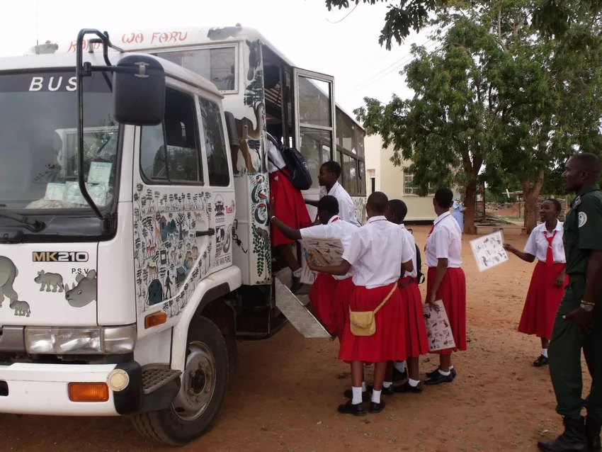 School learners getting onto the bus to go and visit the conservancy to see and learn about wildlife