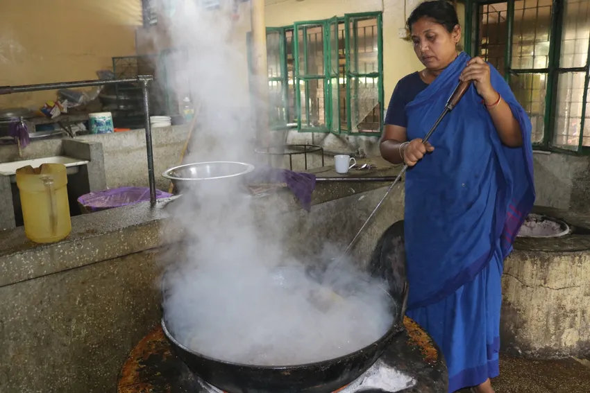 Mother stirring a pot