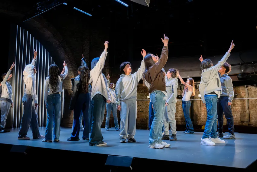 Secondary school students perform a devised piece on the Almeida stage during Almeida Unlocked.