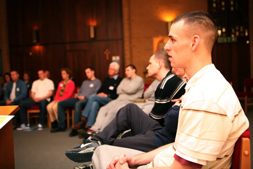 Group in prison chapel