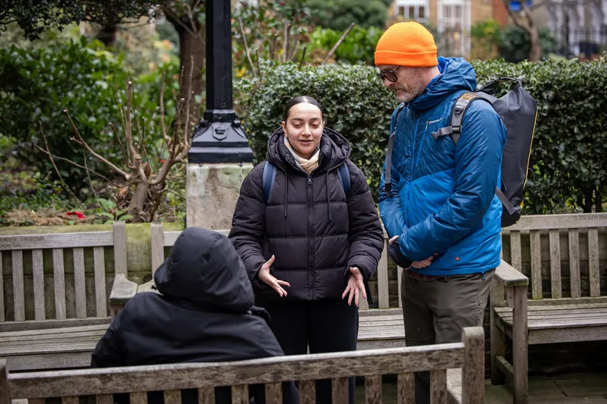 A pair of outreach workers support someone sleeping rough