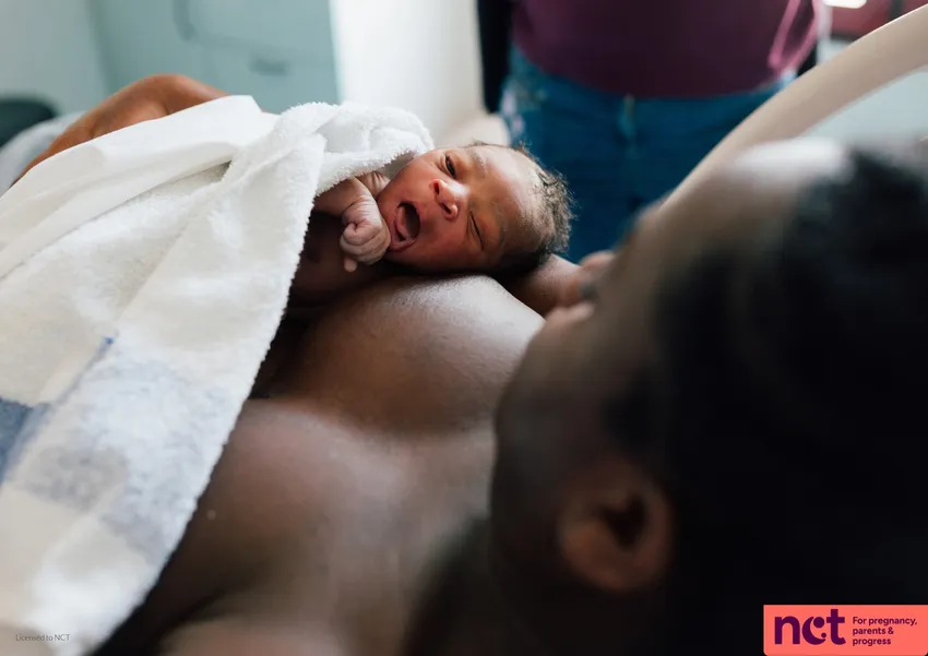 mother and baby on breast