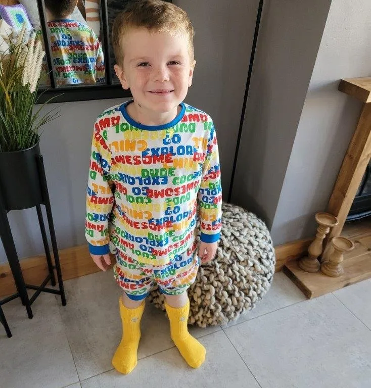 Reid wearing the minion socks from his Kids Kit