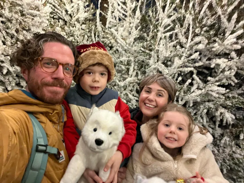 A young woman with cancer enjoying Lapland UK with her family