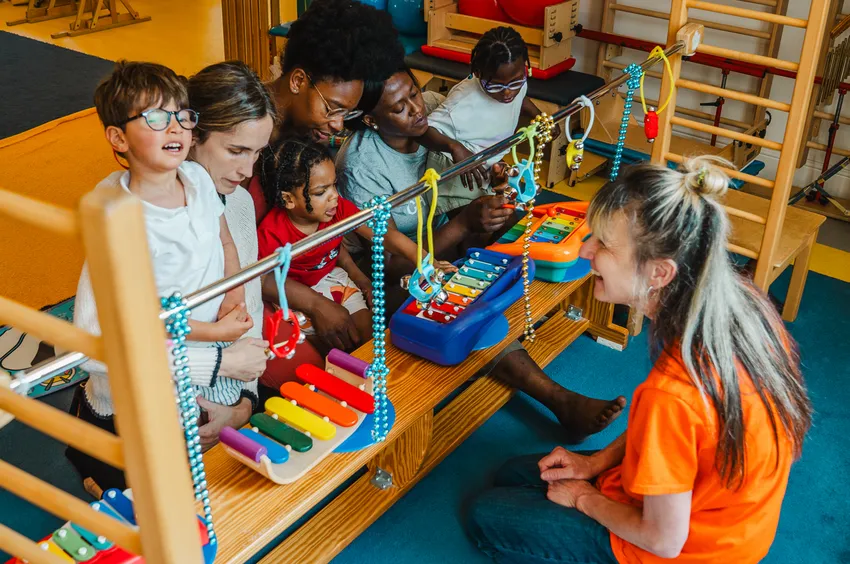 A group of children playing instruments