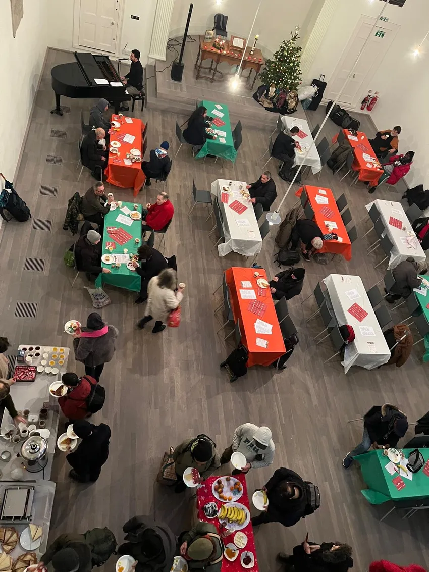 2025 Christmas festive breakfast with Rev Manuel on the piano.