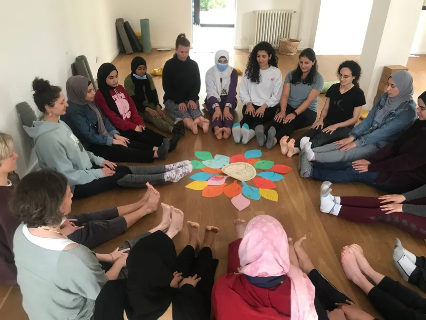 "With yoga, I am better able to understand the people around me and communicate with them in a calm way" - community yoga training participant.