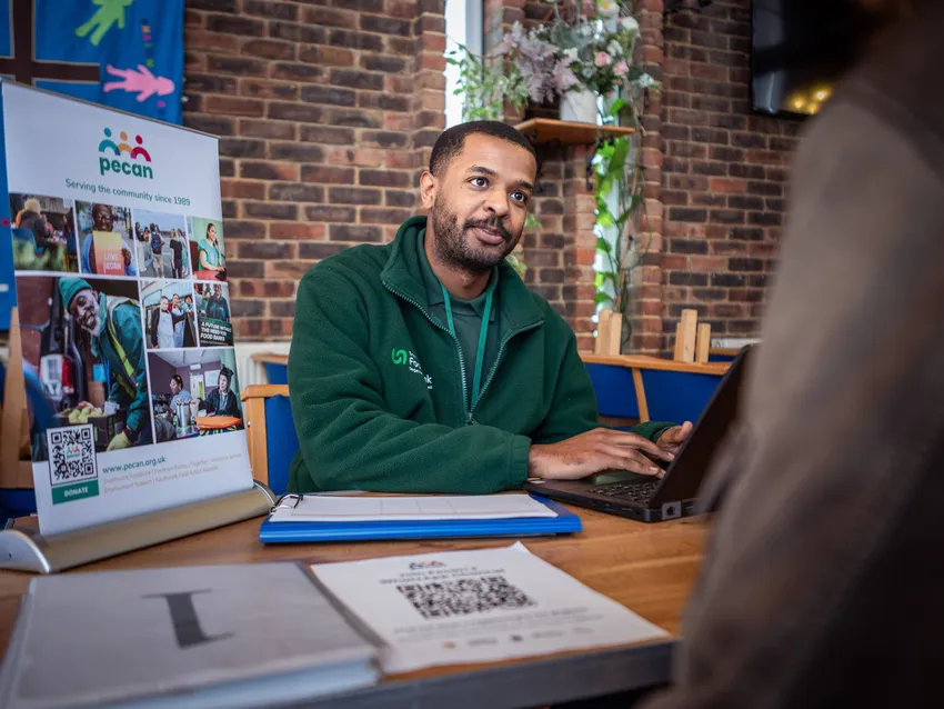 Advisor in Foodbank Session talking to client