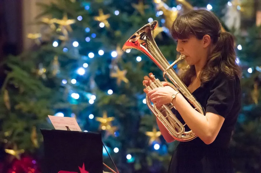 Christmas tree and brass player