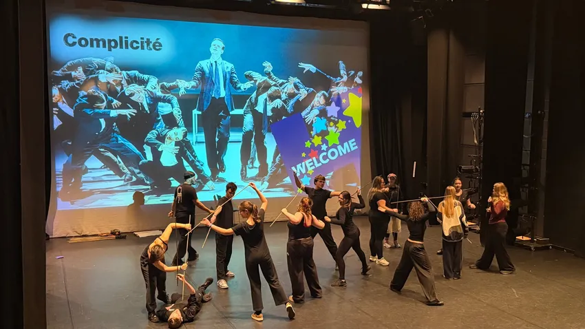 Secondary students take part onstage at a HEN dance festival
