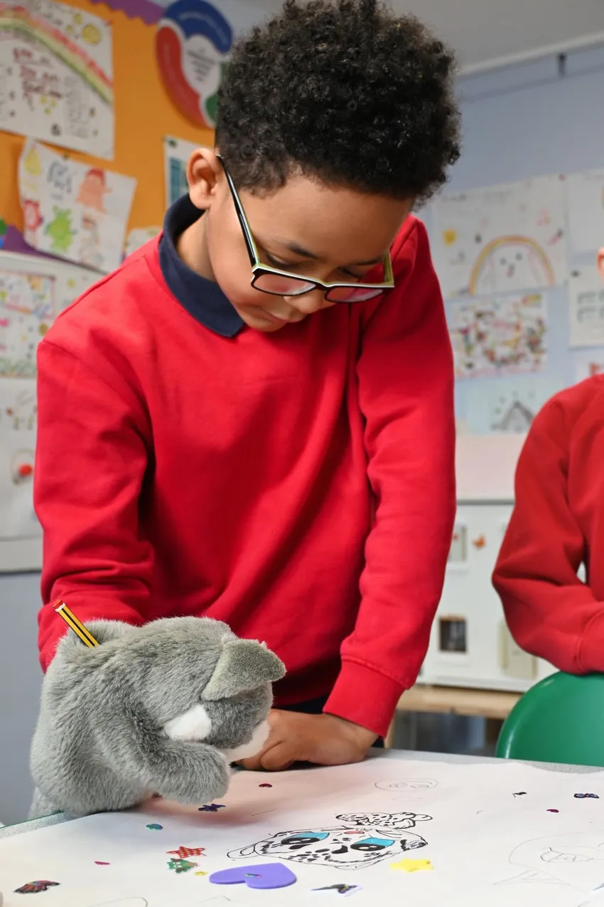 Child and puppet in therapy