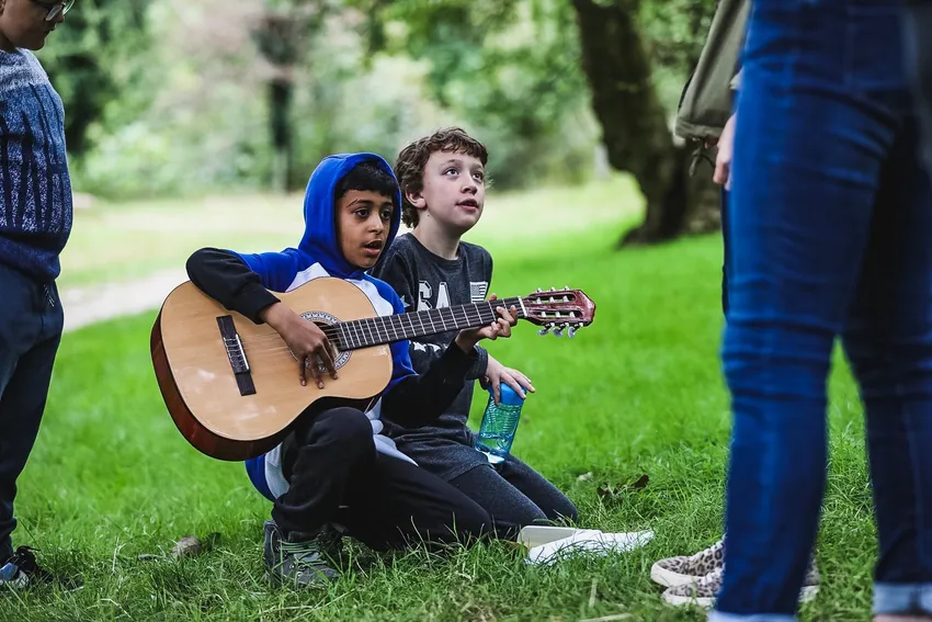 Boy playing guitar