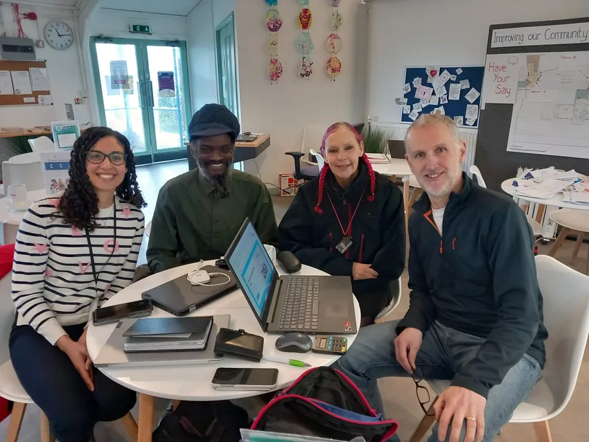 Staff + clients at drop-in Centre