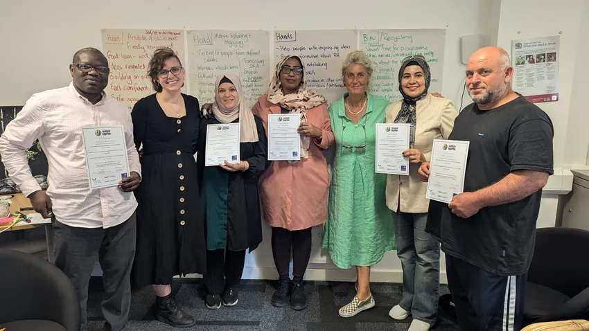 Our Refugee Advisory Group receiving their certificates