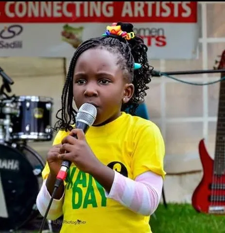 Young child with a microphone