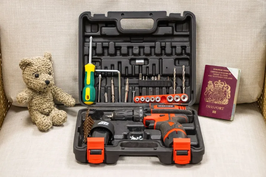 Example Items Stored (teddy bear, passport, work tools)