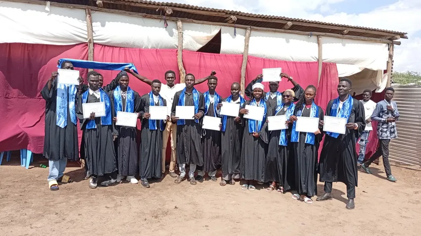 Amala Alumnus with his students at Teach for Commnunity Initiative in Kakuma Refugee Camp