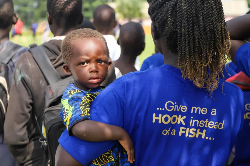 A young woman in the Bonga programme with her child
