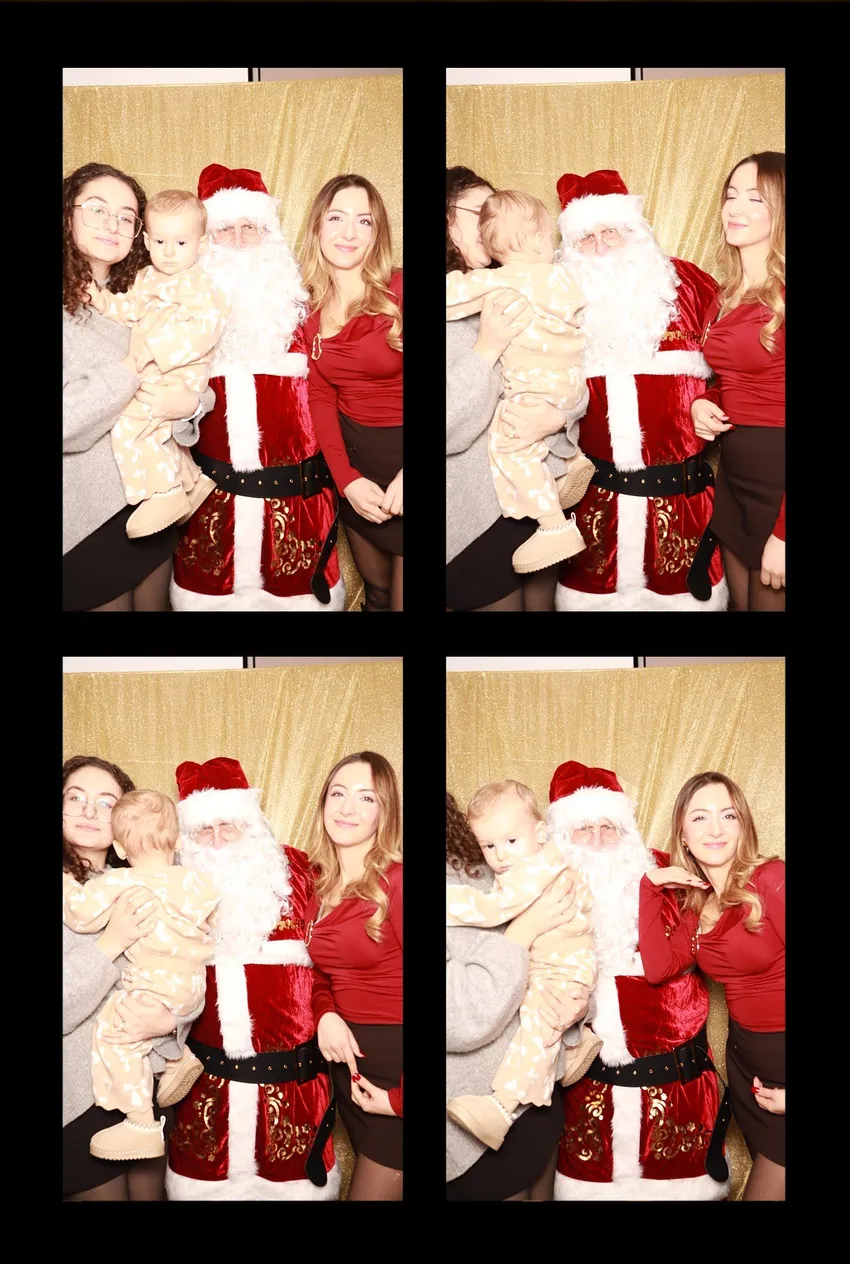 Guest with Santa in the photo booth